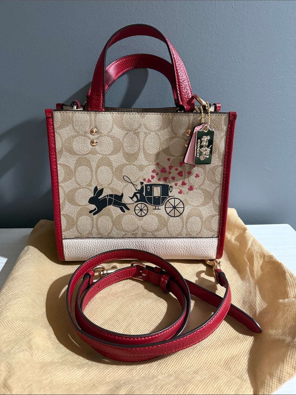 Coach Lunar New Year Dempsey signature canvas with a rabbit and carriage motif